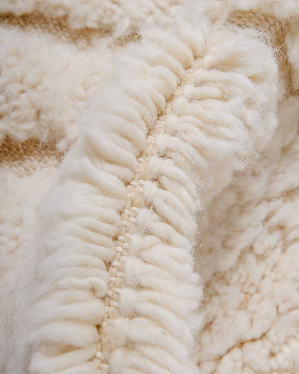 Modern, designer, handcrafted Berber rug from Morocco. Beniourain carpet with beautiful colours and patterns and fluffy wool texture.